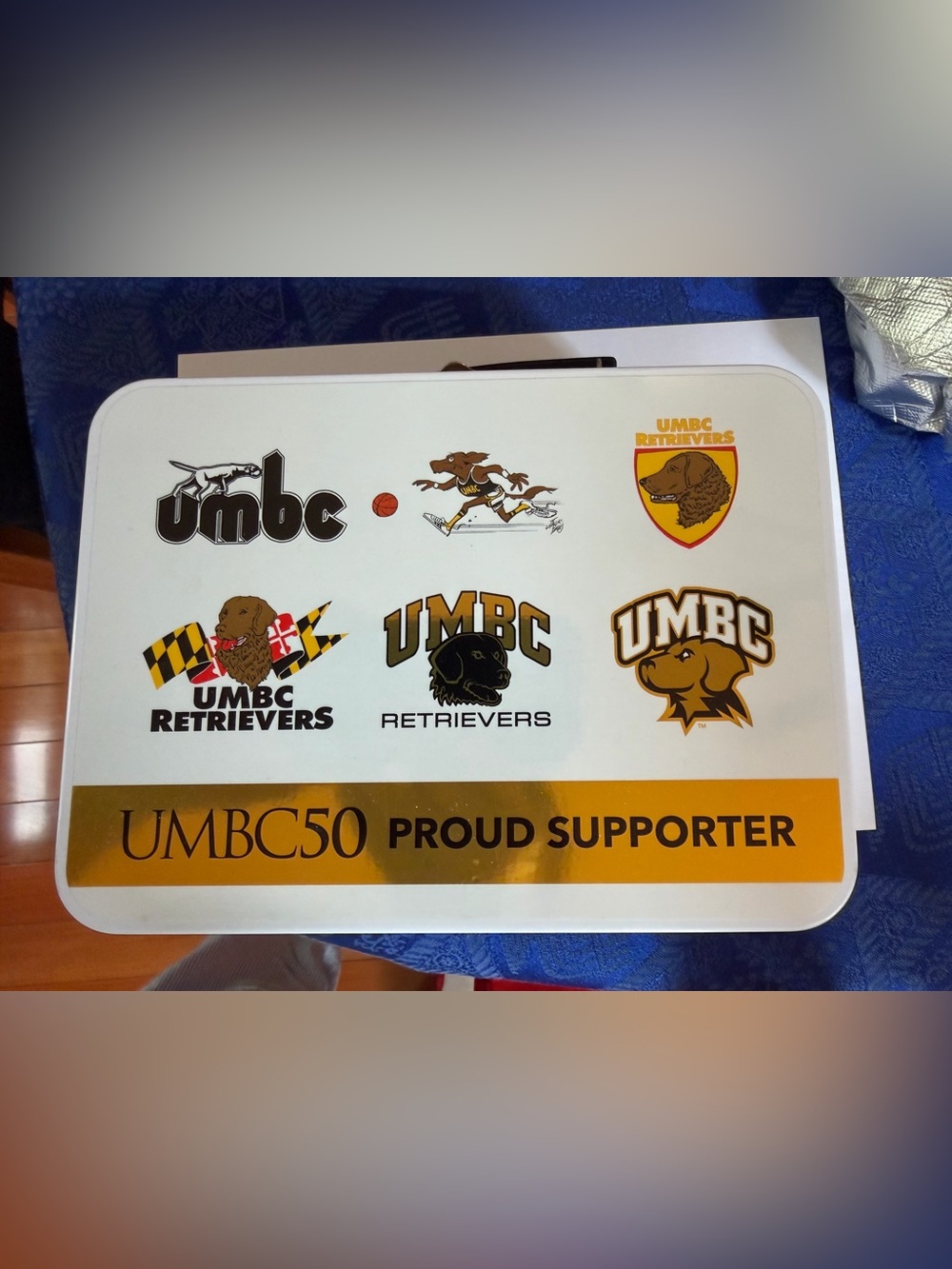 UMBC Commemorative 50th Anniversary  White, Black  & Gold Decorative “Lunchbox”